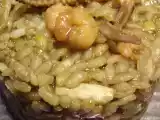 Recette Riz aux fruits de mer et à l'encre de seiche.