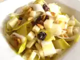 Recette Salade d'endives aux pignons, raisins secs, ossau iraty & miel