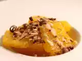 Recette Salade gourmande d'oranges au sirop vanillé, amandes et copeaux de chocolat