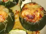 Recette Courgettes rondes farcies aux petits légumes (m)