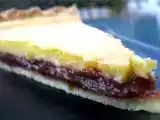 Recette Tarte à la frangipane sur un lit de compotée prunes/figues