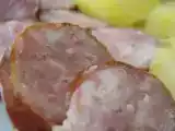 Recette Saucisses fumées au chou frisé.